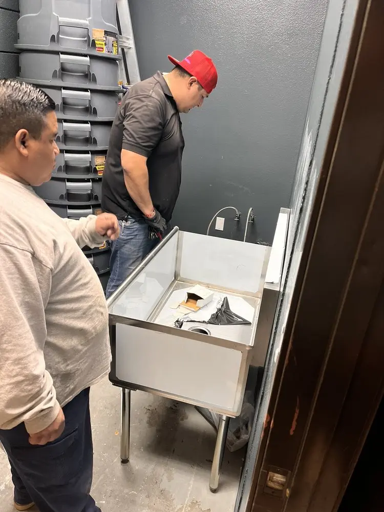 Commercial plumbing and sink installation in Oakland
